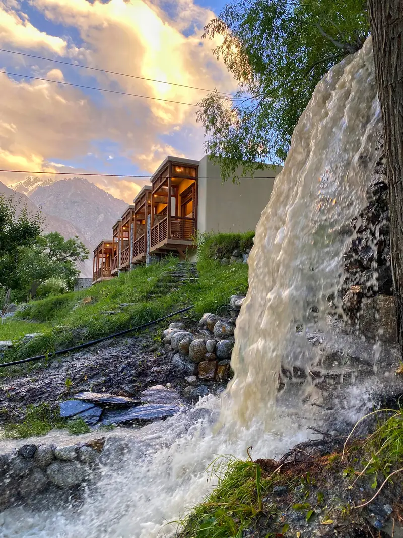 The garden waterfall beside the resort at golden hour